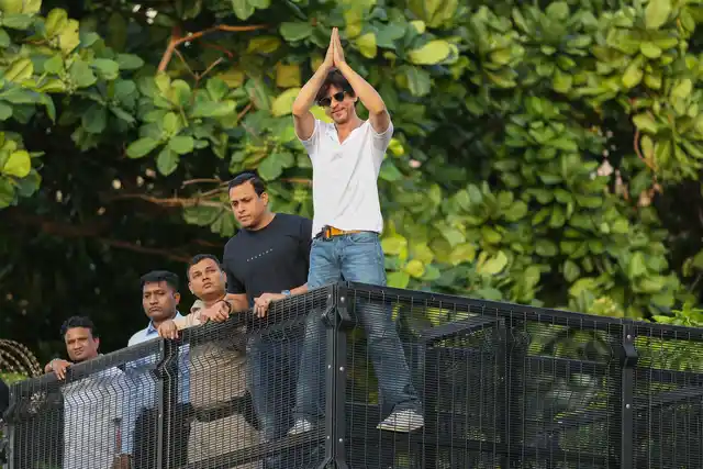 Shahrukh Khan waves at his fans on the occasion of his birthday from his residence in Mumbai.