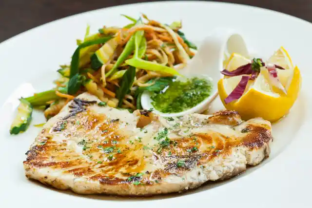 It is okay to eat fish (including canned tuna) in moderation not exceeding two servings a week.