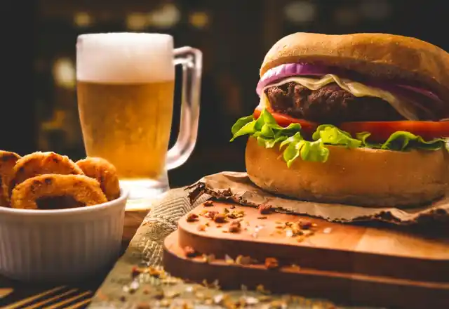 Alcohol and junk food are the two friends your mother warned you about.