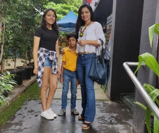 Zareen (right) with her daughter (left) and son.