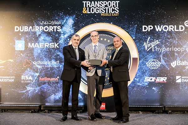 <em>Ramzi Al Zerouni (left), General Manager – Administration, Government & Business Affairs, and Paul Rehmet, Chief Product Officer (center), accept the Logistics Technology Platform of the Year award from Jude Fernandes, Head of Cargo Business Planning, Dubai Airports (right).</em>
