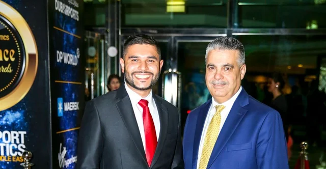 Sam Khan shares a light moment with Youssef A. Beydoun