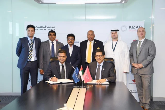 Mr. Jalal Essudeen, Executive Director, Trustworthy.ae Group and Mr.Samir Chaturvedi, CEO, KIZAD, sign the investment agreement on Sunday. Mr. Abdul Lathif, Managing Director, Trustworthy.ae Group (third from left), Mr. Mohan Pandithage, Chairman, Hayleys PLC (third from right) and senior directors from Hayleys Advantis Limited, KIZAD and Abu Dhabi Ports were also present on the occasion.