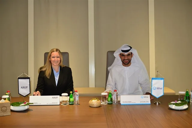 The signing of the agreement between Arup and Smart Dubai (R)