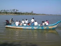 குடித்துவிட்டு படகில் வந்த தொழிலாளி ஆற்றி்ல் விழுந்து பலி