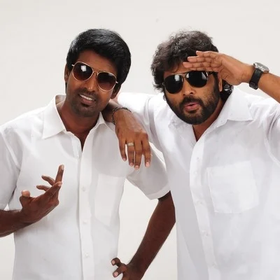 புலி படம் வெளியாகும் நாளில் கத்துக்குட்டி வெளியாவது எதனால்? தயாரிப்பாளர்கள் விளக்கம்