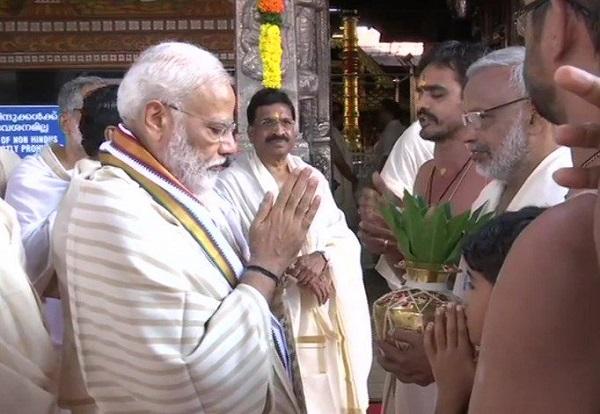 `எடைக்கு எடை தாமரை; ஒரு மணிநேரம் வழிபாடு!' - குருவாயூர் கிருஷ்ணன் கோயிலில் பிரதமர் மோடி