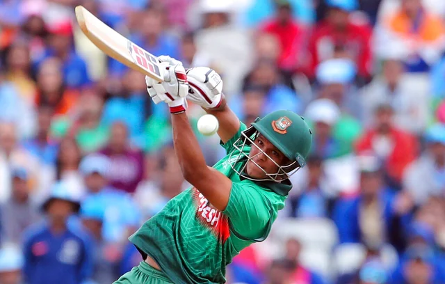 Mohammad Saifuddin Plays a shot.