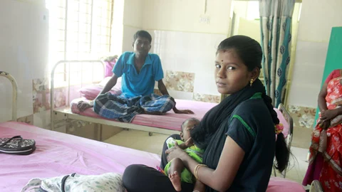 சண்முகம் குழந்தை, மனைவியோடு...