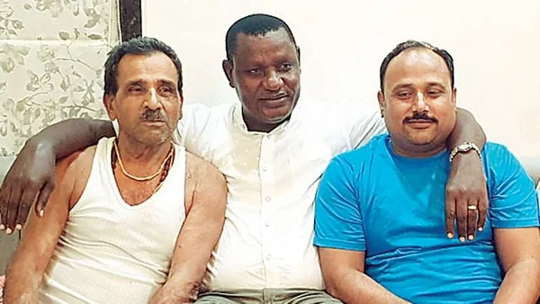காவ்லி மகனுடன் ரிச்சர்ட்