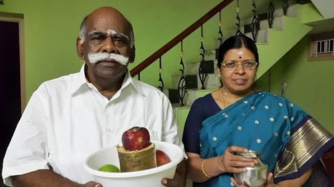 கணவருடன் உமா மகேஸ்வரி