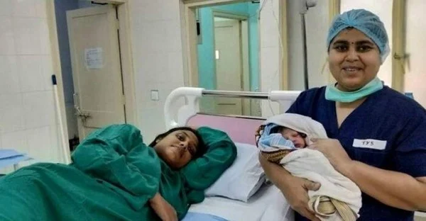 Sajitha giving birth to her child