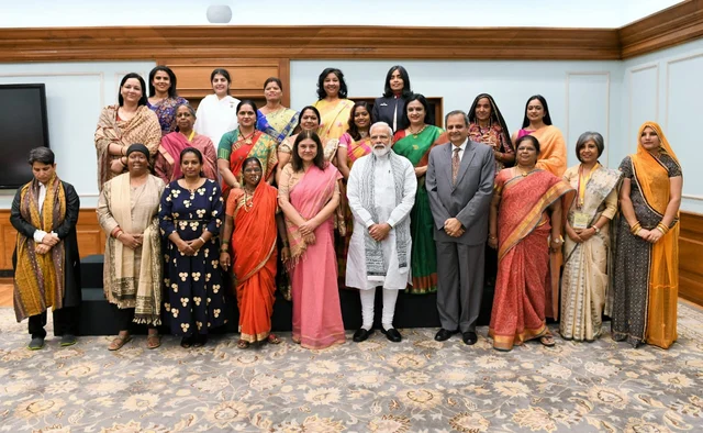 Pushpa with PM Modi