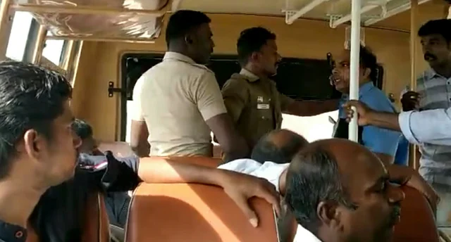 கண்டக்டரை தாக்கிய போலீஸ்