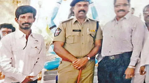 Murugan with police