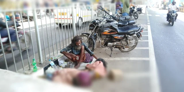மேம்பாலத்தின் கீழ் கணேசன் - சரசு