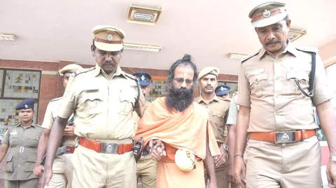 வேலூர் நீதிமன்றத்துக்கு அழைத்துவரப்பட்ட முருகன்