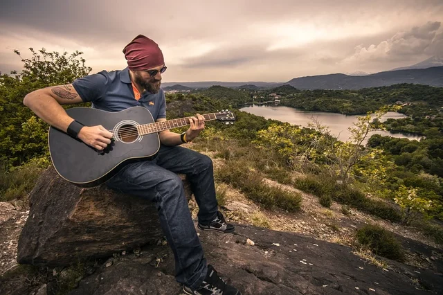 A Man playing guitar