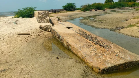 சேதமான மணல் அணை