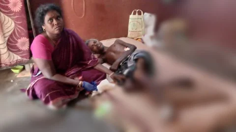 அழகேந்திரன் மனைவியுடன்