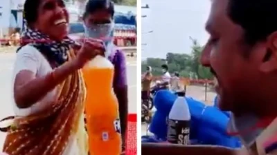 போலீஸாருக்கு கூல்டிரிங்ஸ் கொடுத்த பெண்