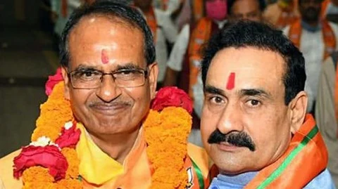 கொரோனா பரவி ஒரு மாதம் கழித்து பதவியேற்ற அமைச்சர்