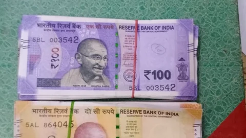 பறிமுதல் செய்யப்பட்ட கள்ள நோட்டுகள்