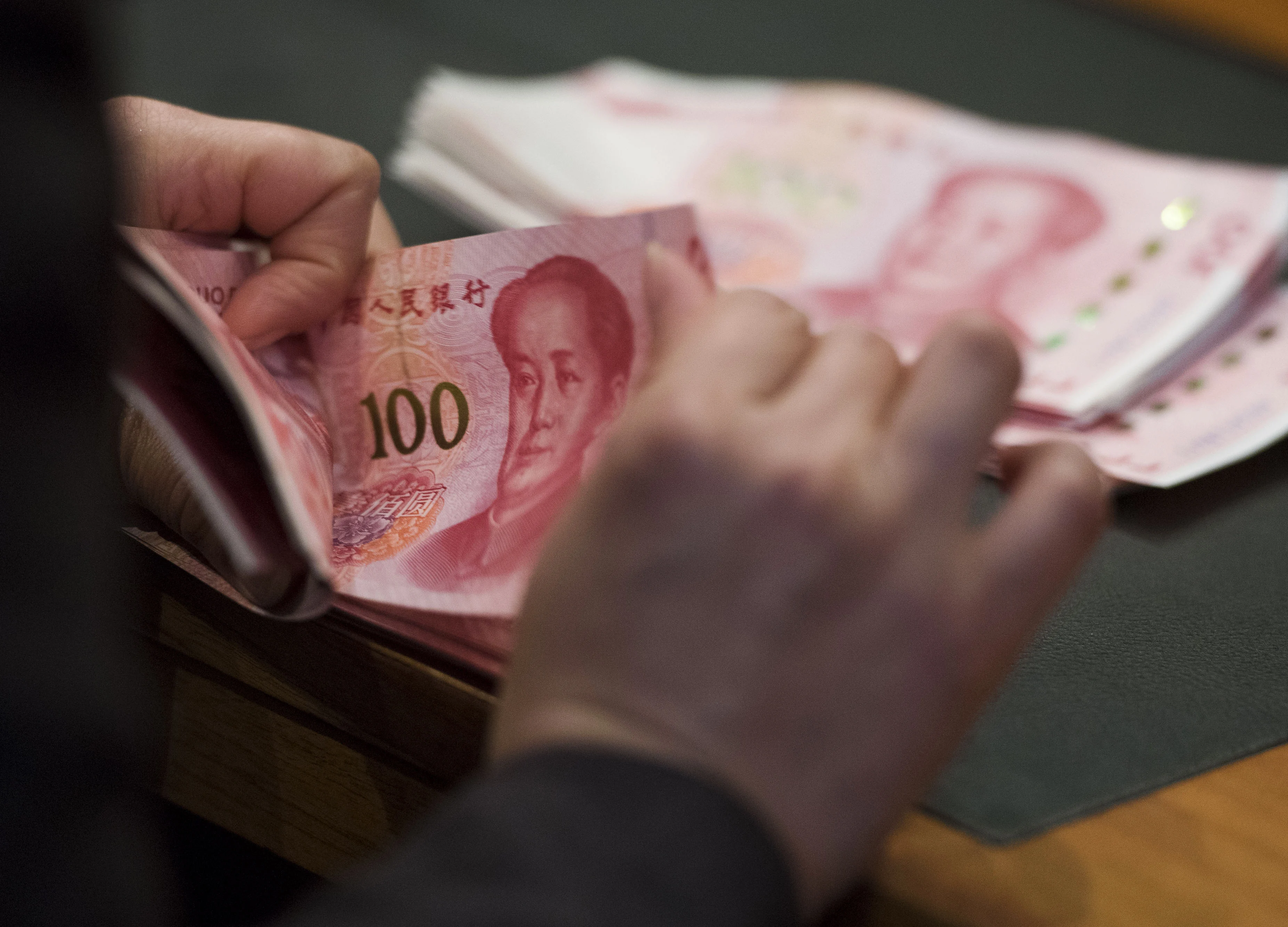 China's Stocks Lurch Lower as Weakening Currency Adds to Risks