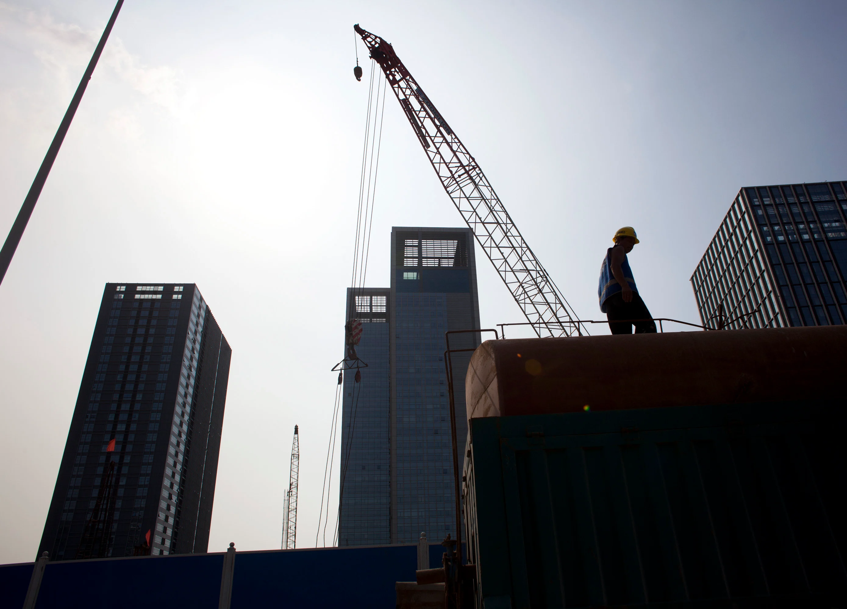 China Builders Weaken Debt Safeguards as Buyers Chase Yield