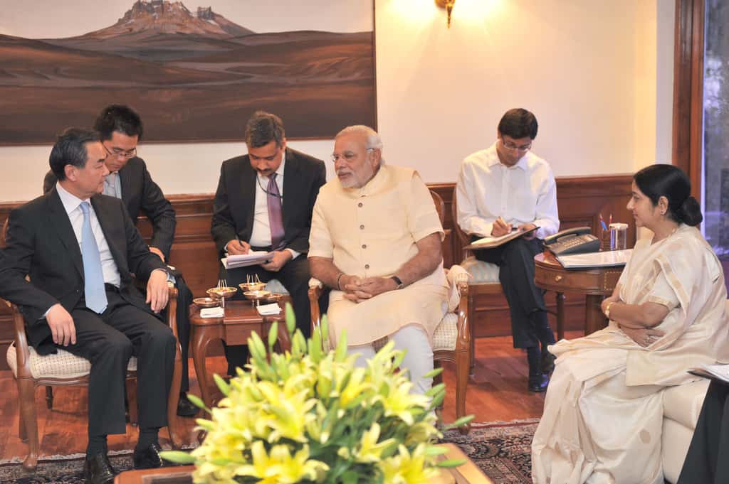 Minister of Foreign Affairs of the People’s Republic of China Wang Yi meets Prime Minister Narendra Modi and Minister for External Affairs Sushma Swaraj in New Delhi, on June 9, 2014. (Photograph: PIB)