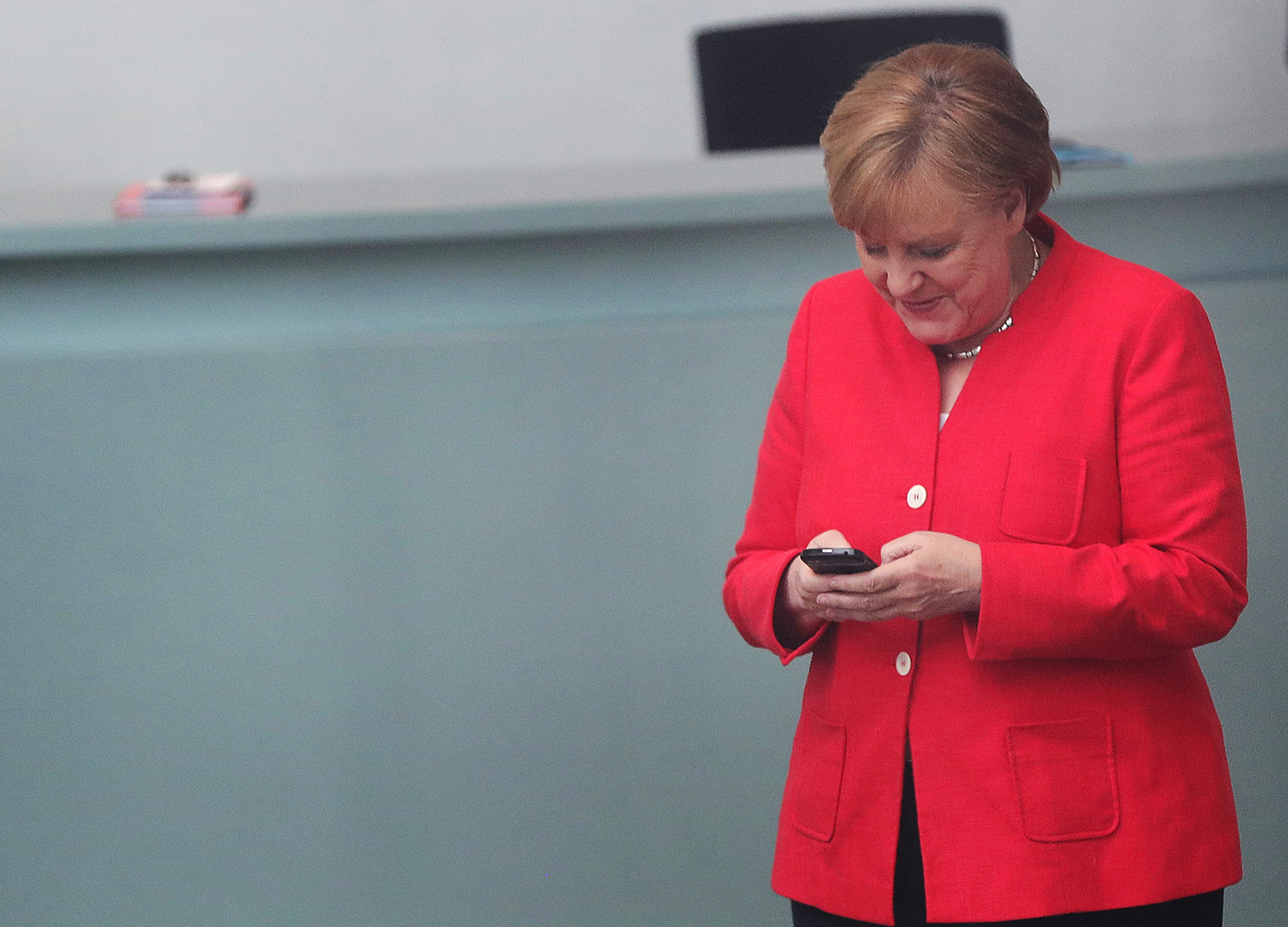 Merkel Steps Down as Party Leader as Election Setbacks Take Toll