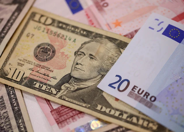 China Foreign Currency Reserves Drop On Trade Tensions Yuan A U S Ten Dollar Bills Sits Among And Twenty Euro Banknotes In This Arranged Photograph London K Photographer Simon Dawson Bloomberg
