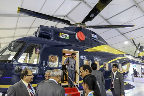 A prototype of an Indian Multi Role Helicopter, manufactured by Hindustan Aeronautics Ltd. at the Aero India 2017 air show. (Photographer: Dhiraj Singh/Bloomberg)