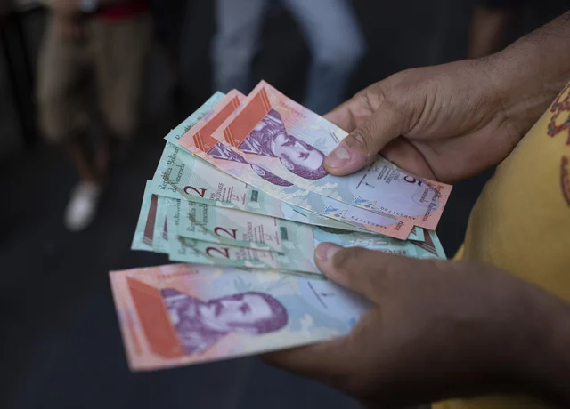Venezuela S Bolivar Devaluation Invites Nation Wide Strike Venezuelans Grle With Maduro S Baffling New Economic Plan