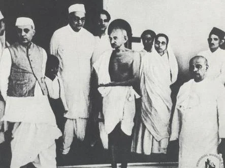 Mahatma Gandhi with Jawaharlal Nehru on his right, and Vallabhbhai Patel on his left. (Photograph: Nehru Memorial Museum and Library)