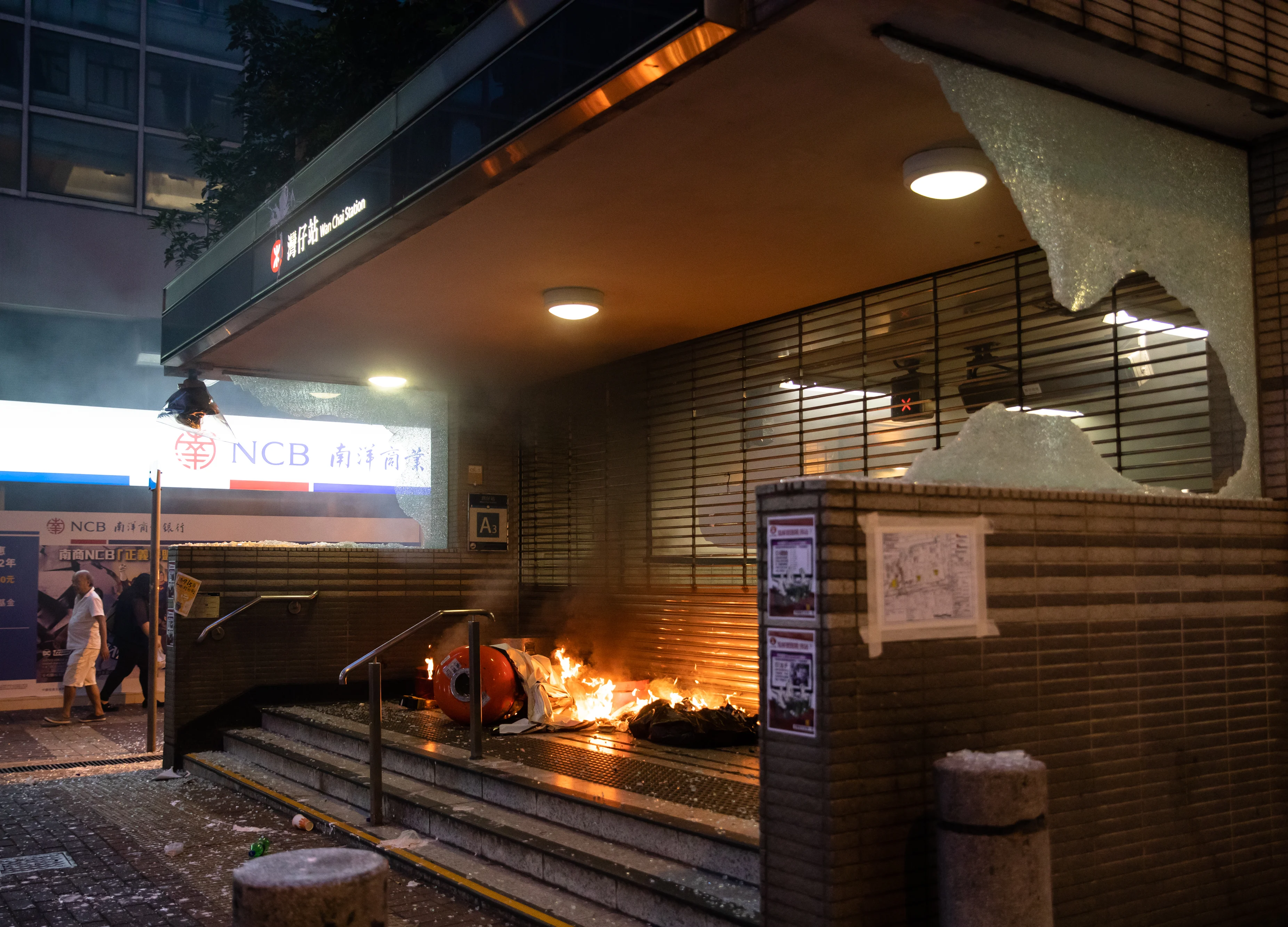 Hong Kong Protesters Battle Police, Set Fire to Key Subway Station