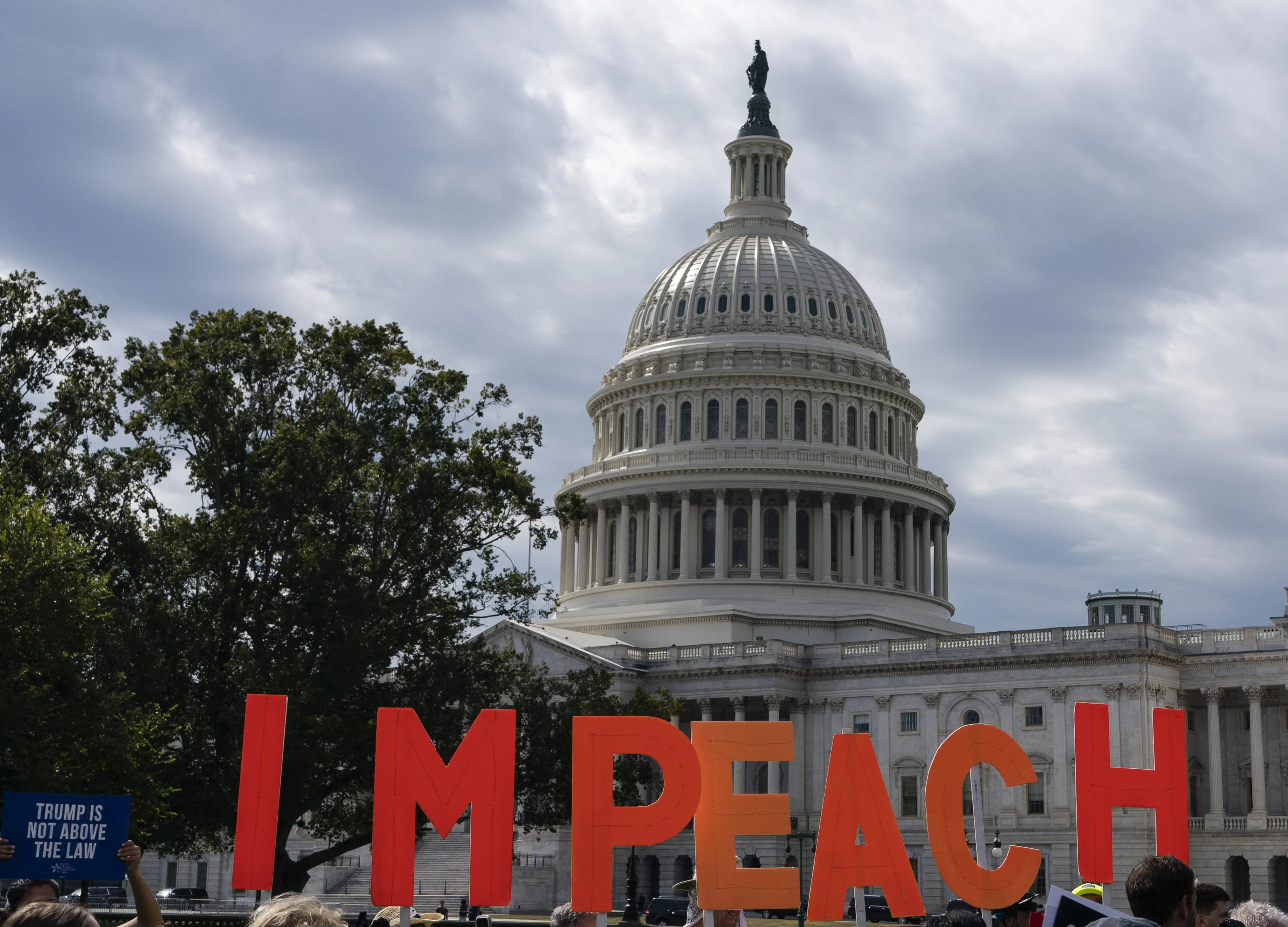Raid Gives Trump Timely Win But Unlikely to Slow Impeachment
