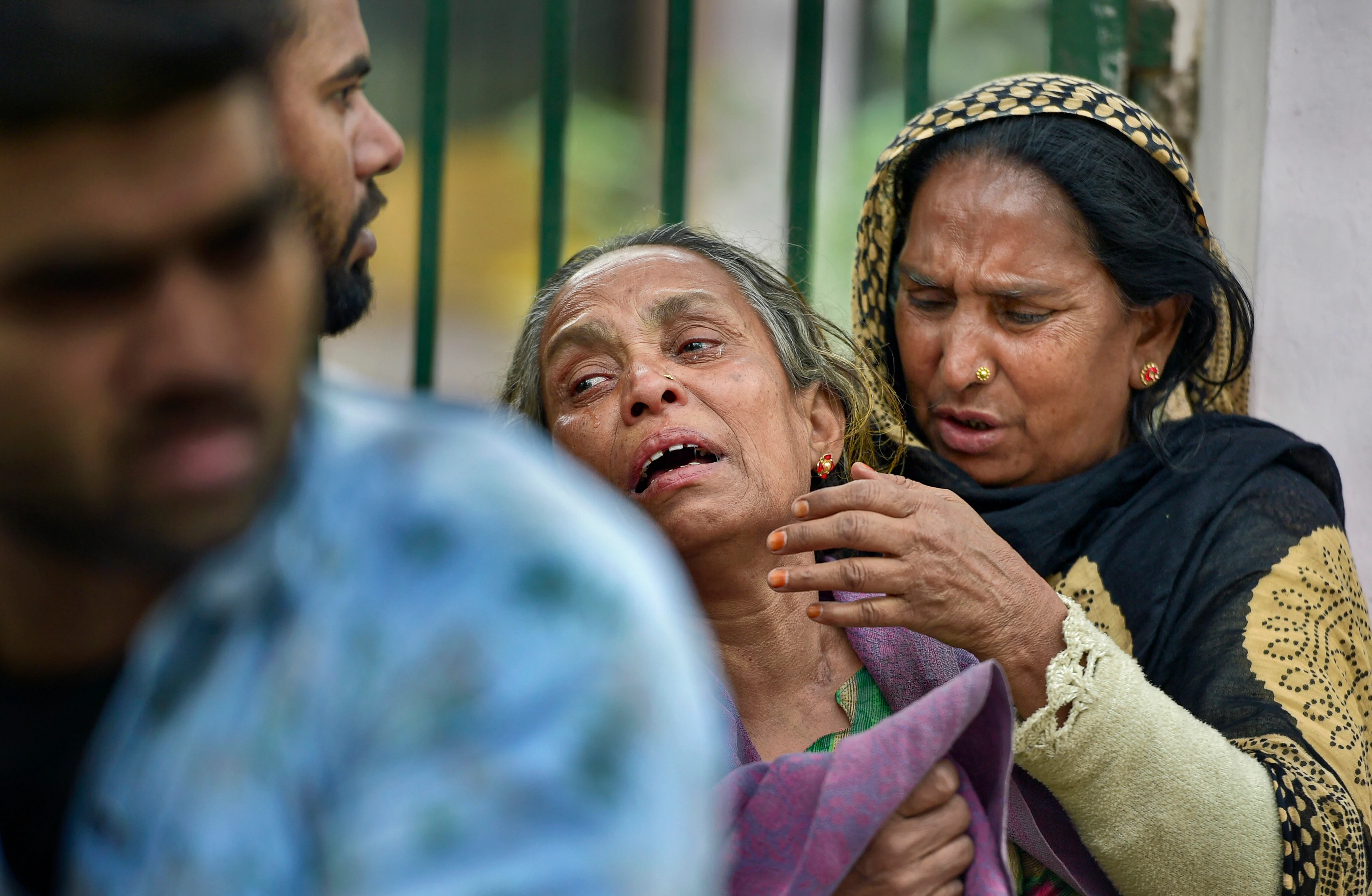 Muqima Khatun, mother of Shahbaz who went missing during the communal clashes in northeast Delhi, wails outside the mortuary of GTB Hospital (Source: PTI)