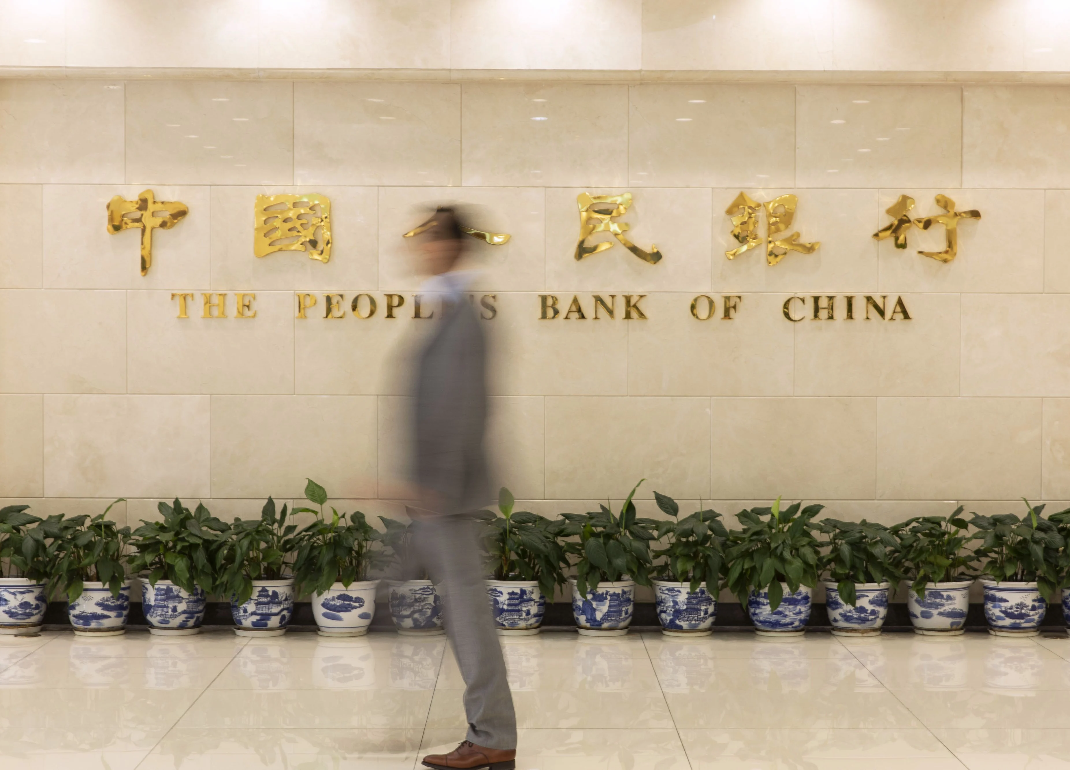 PBOC Acts to Stabilize Yuan After Currency Underperforms