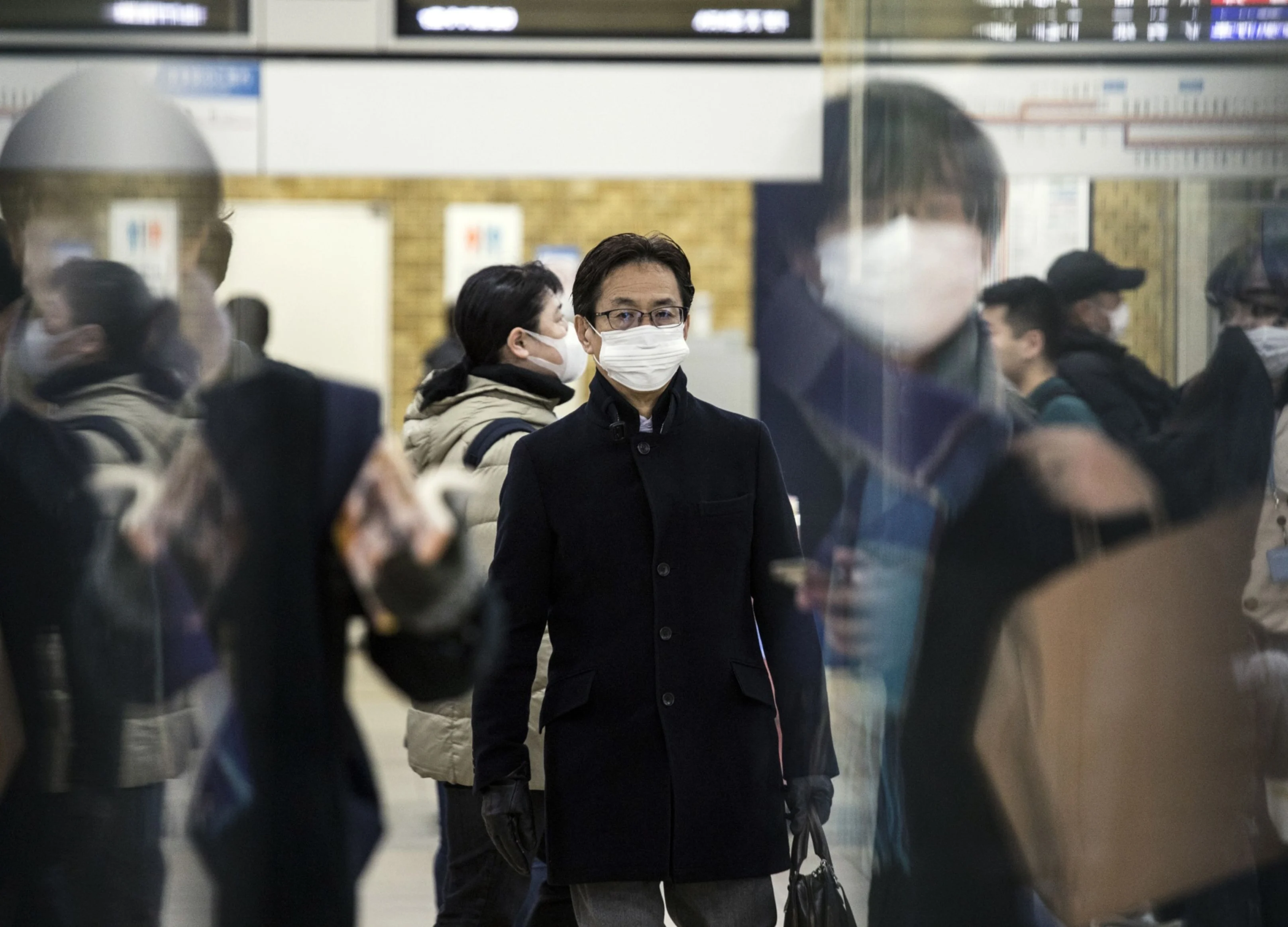 Japan Virus Woes Pose Existential Threat to Abe Government
