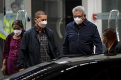 Ousted Sri Lankan leader faces arrest calls after return