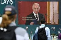 Britain's King Charles III is seen on a giant screen as he speaks during a meeting of the Accession Council to proclaim his as the King, on day 2 of the BMW PGA Championship at Wentworth Golf Club, south-west of London, on September 10, 2022. - The European golf's PGA Championship resumes Saturday, after it was cancelled on Friday as a mark of respect following the death of Queen Elizabeth II on September 8. Photo by Glyn KIRK / AFP
