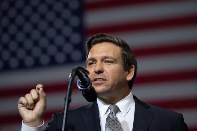 Migrants flown to island suing Florida gov