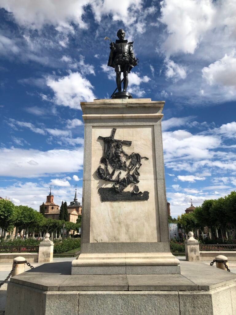 Statue of Miguel de Cervantes at Plaza Cervantes in Alcala de Henares, Spain.