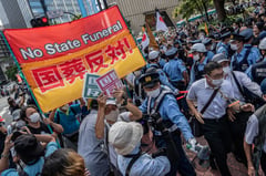 Japan honors assassinated Abe at controversial funeral
