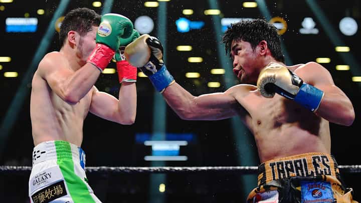 EMILEE CHINN/AGENCE FRANCE-PRESSE
Marlon Tapales (right) mixes it up with Japanese Ryosuke Iwasa in their December 2019 clash at the Barclays Center in Brooklyn, New York. Tapales is back in the United States to begin training for a possible world title shot.