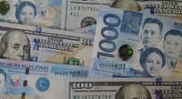 Widening BOP deficit pushes peso down to P58.94:$1