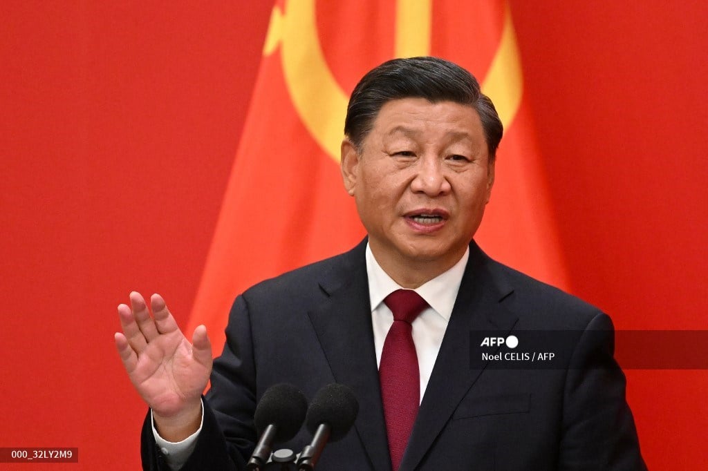 China's President Xi Jinping speaks during the introduction of members of the Chinese Communist Party's new Politburo Standing Committee, the nation's top decision-making body, to the media in the Great Hall of the People in Beijing on October 23, 2022. (Photo by Noel CELIS / AFP)