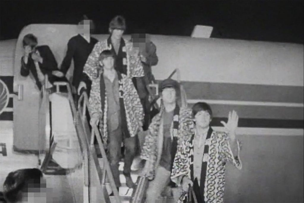 This handout taken on 29 June 1966 and released to AFP shows The Beatles (top to bottom) George Harrison, Ringo Starr, John Lennon, and Paul McCartney arriving for their 1966 Japan Tour in Tokyo. (Photo by Handout / various sources / AFP)