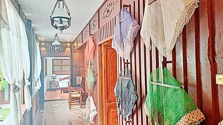 HAMOY residence hallway adorned with colorful fans. | PHOTOGRAPH BY MARKY RAMONE GO